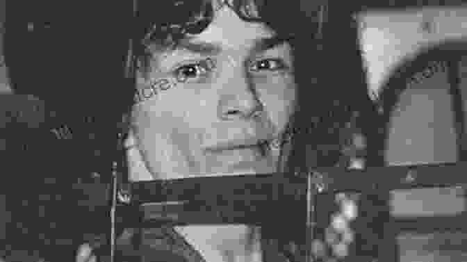 Black And White Mugshot Of Richard Ramirez With Dark Hair And Eyes Resembling A Sinister Grin The Night Stalker Killer: Life Of Serial Killer Richard Ramirez (Serial Killer True Crime 13)